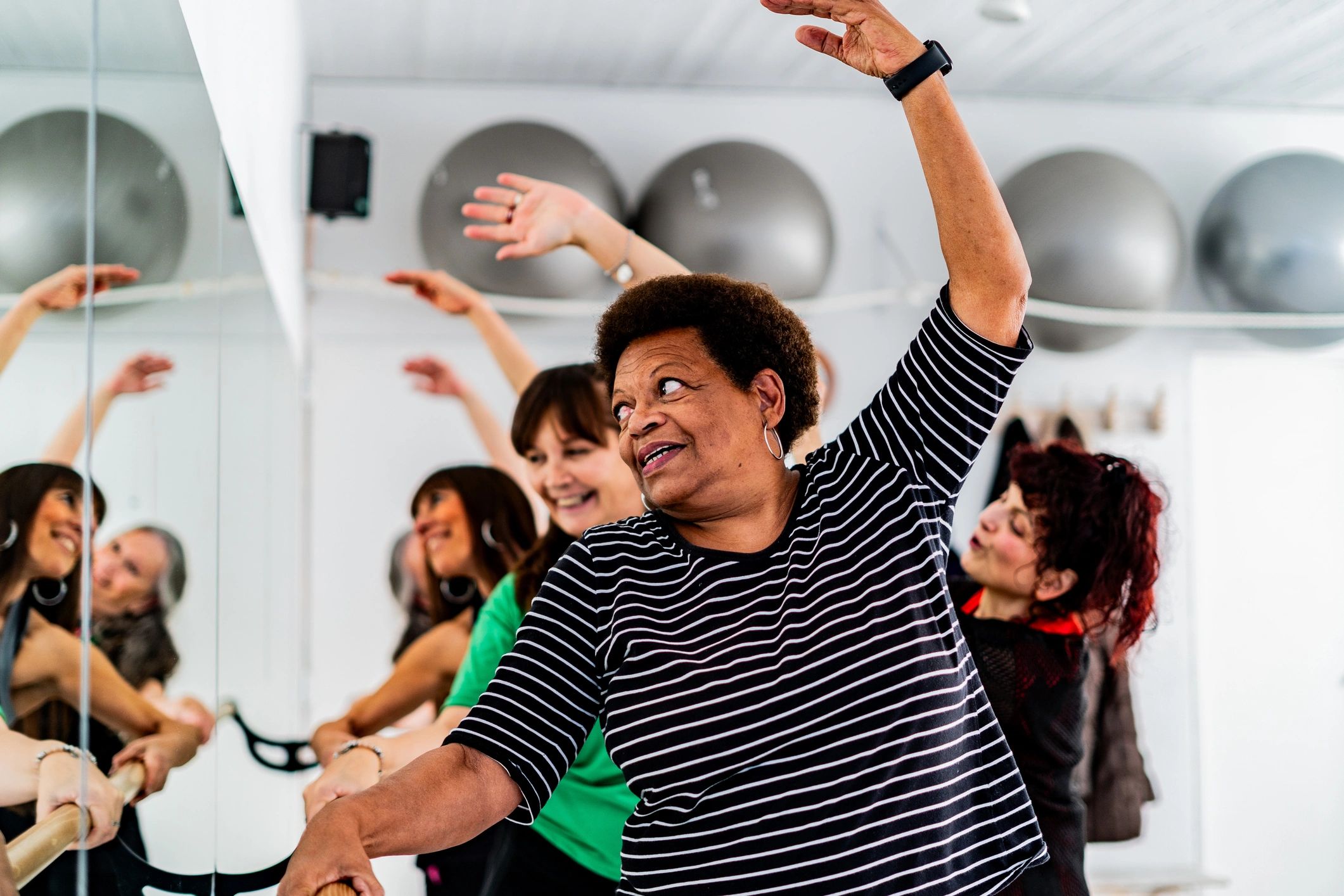 Dancer rehearsing movement in a studio